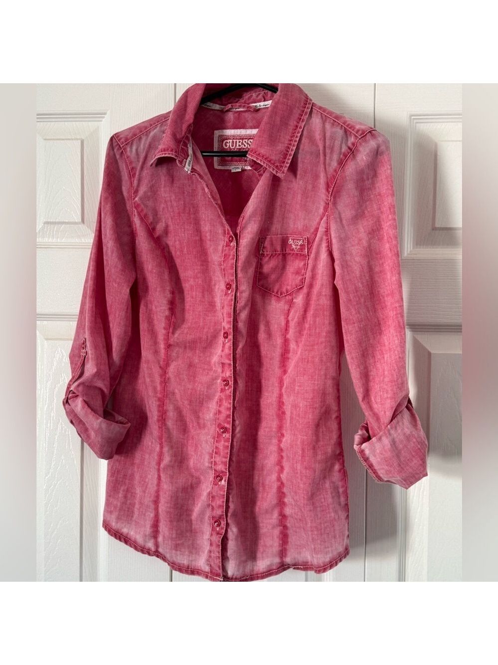 Guess women's pink long-sleeve button-down shirt size L.